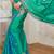 Green and blue dual tone zari weaved silk saree with blouse
