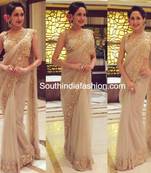 cream embroidered net saree with blouse