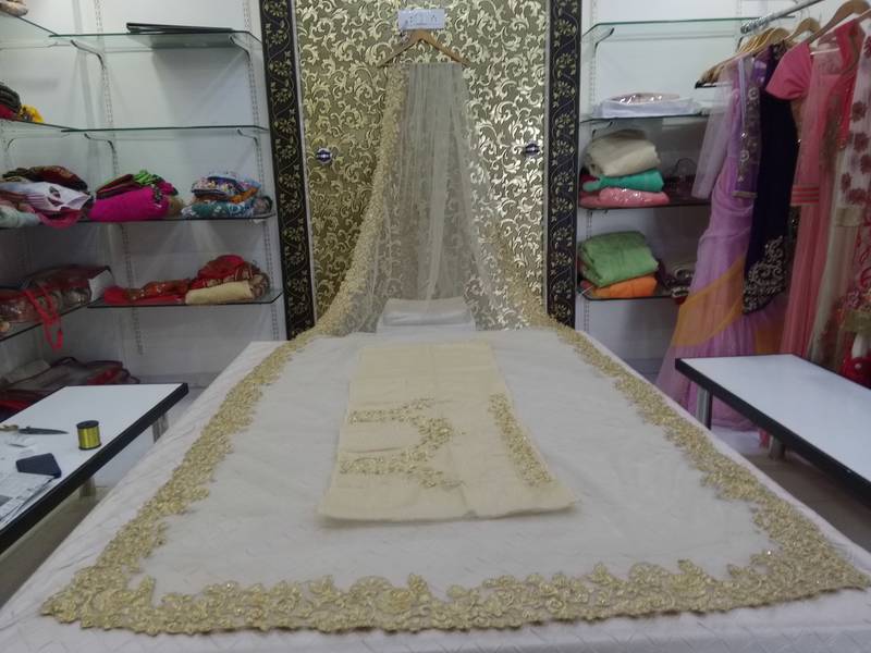 cream embroidered net saree with blouse