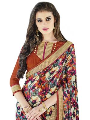 Beige embroidered georgette saree with blouse 2