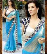 blue designer saree with velvet jacket