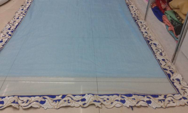 blue designer saree with velvet jacket