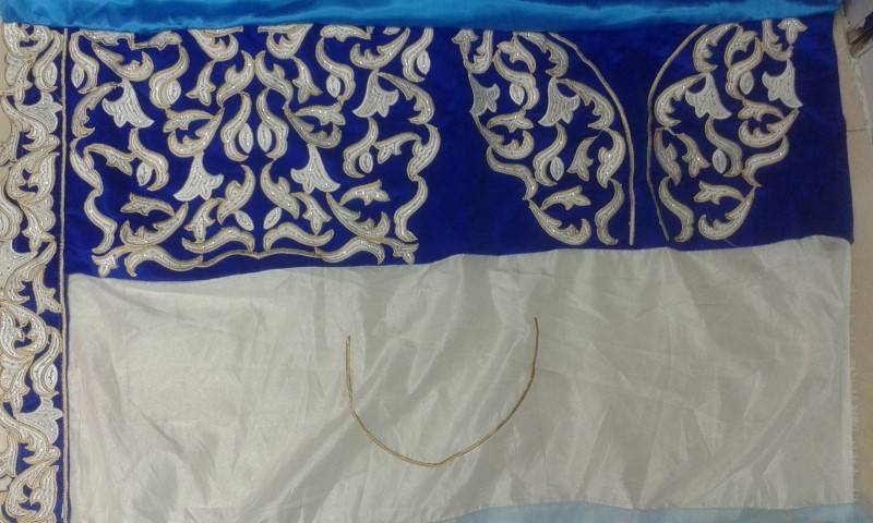 blue designer saree with velvet jacket