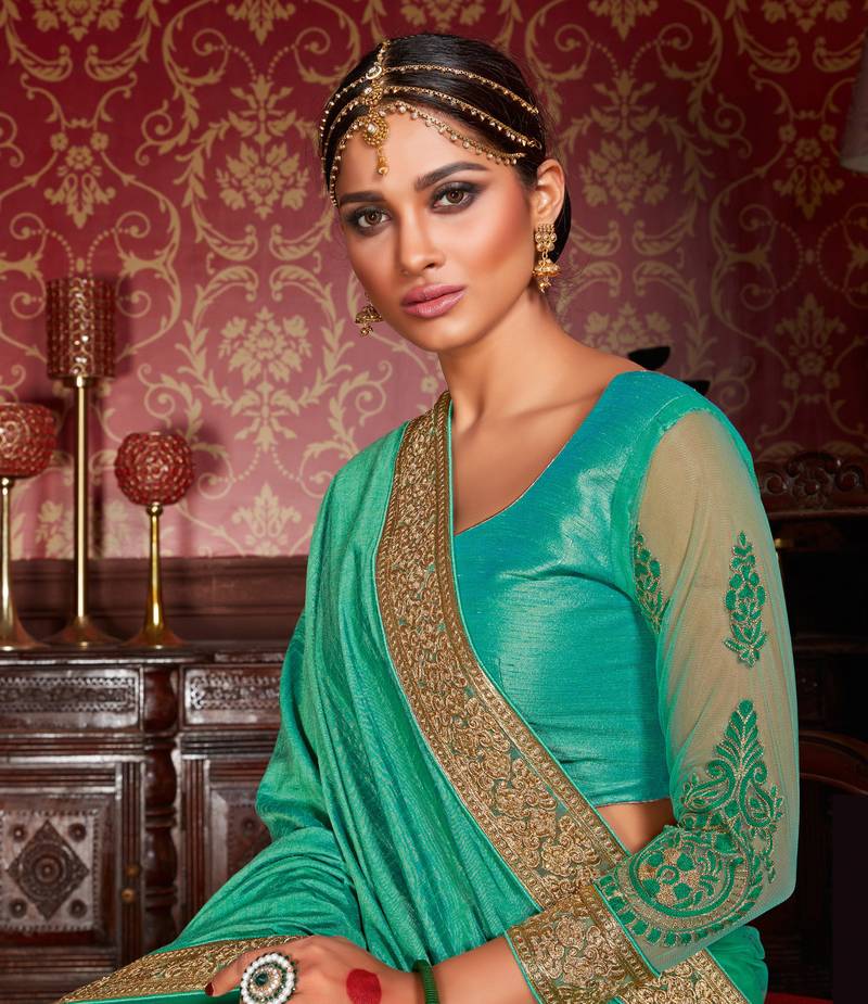 Women Turquoise Art Silk Printed Saree With Unstitched Blouse