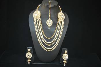 Multi layer Bridal Jewellery set Studded with White Stones and Pearls (4 Pieces) 1