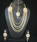 Multi layer Bridal Jewellery set Studded with White Stones and Pearls (4 Pieces)