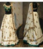 white embroided Tapeta silk lehenga with choli