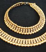 Reeti Fashions - Elegant Gold studded Stones with yellow Pearls anklets