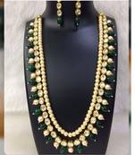 Kundan And Pearl Necklace Set With Green Onyx Gemstones