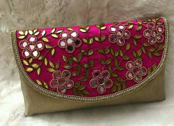 Pink shimmer hand woven clutches 1