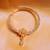 Big American Diamond Spring Gold Plated Nose Ring