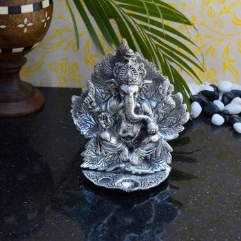 eCraftIndia White Metal Chaturbhuj Lord Ganpati Statue 1