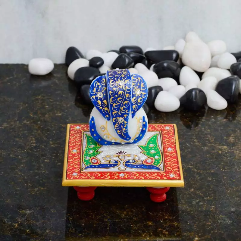 eCraftIndia Glorious Lord Ganesha with Peocock on Marble Chowki