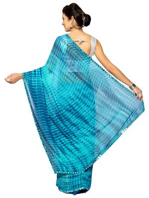   turquoise printed georgette saree with blouse 2