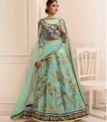 Turquoise embroidered net unstitched lehenga