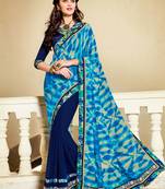 Navy blue embroidered georgette saree with blouse