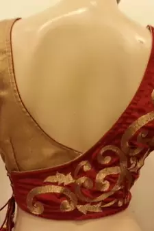 stunning maroon velvet and golden blouse.