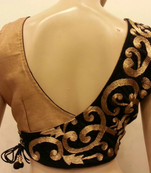 stunning black velvet and golden blouse.