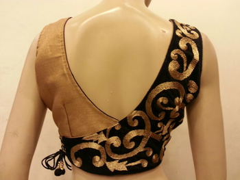 stunning black velvet and golden blouse. 1