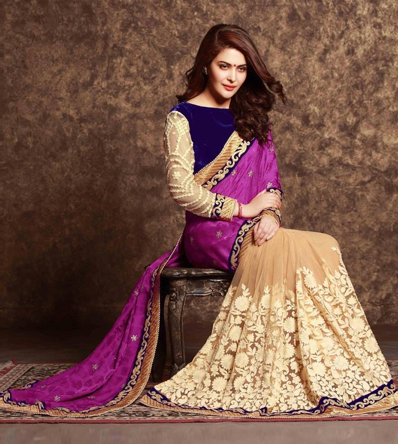 light chiku embroidered net saree with blouse
