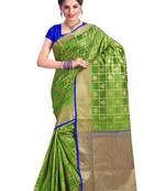 Green woven silk saree with blouse