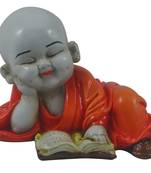 India Polyresine Baby Buddha Reading Book Showpiece