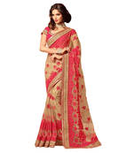 Pink embroidered net saree with blouse