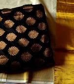 Kasavu saree with brocade blouse