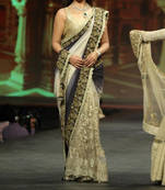 Rashmi desai ramp walk cream saree