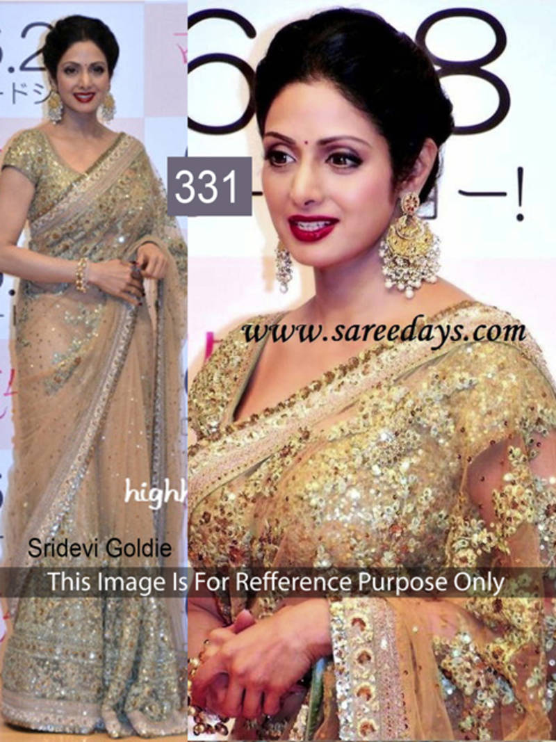 Golden embroidered net saree with blouse
