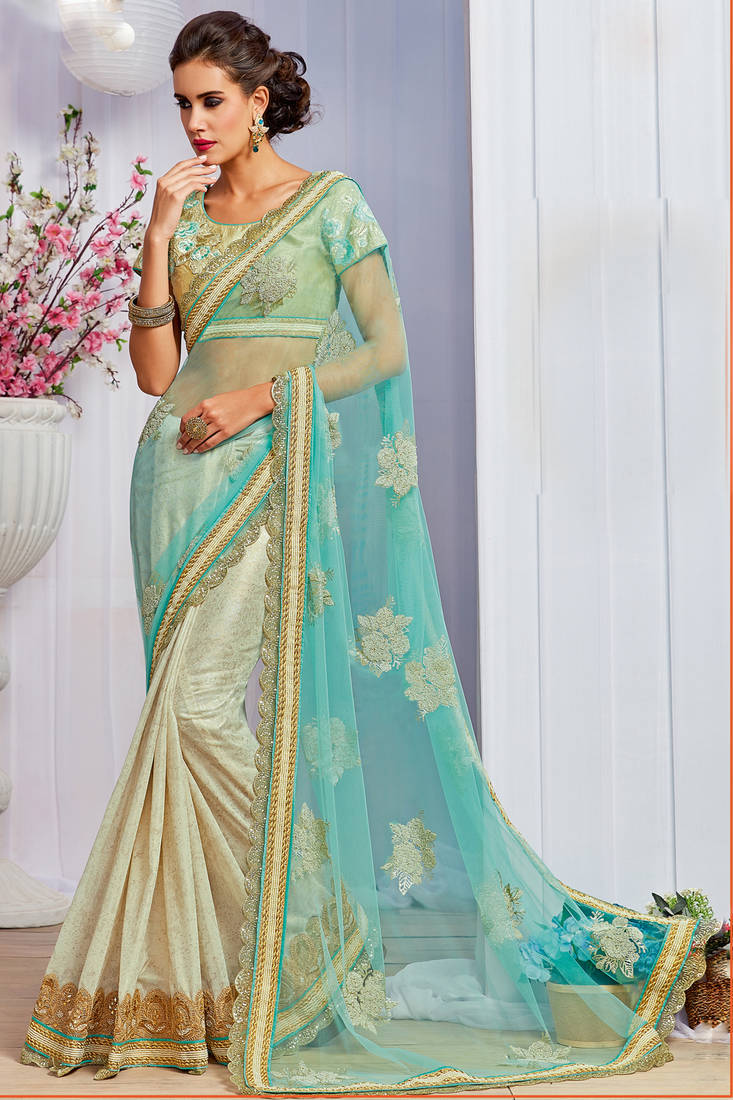 Women's Net Light Blue Embellished Designer Saree With Blouse Piece