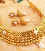 Mesmerizing White Kemp Metallic Necklace set with Jhumkas
