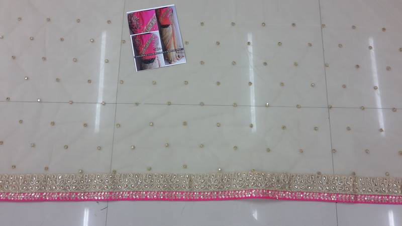 Peach Embroidered Net Saree main image 0