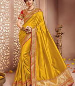 Yellow plain silk saree with blouse