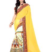 Yellow embroidered georgette saree with blouse