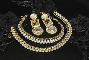 Gold Plated Handcrafted White colour Earrings & Pearl Anklets 1