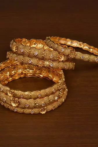Gold plated gheru copper made bangles-and-bracelets