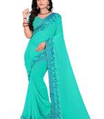 Turquoise Woven Georgette Saree With Blouse
