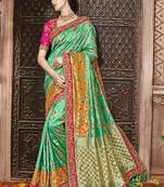 Green embroidered kanchipuram silk saree with blouse
