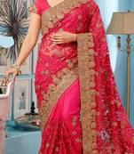 Pink  embroidered net saree with blouse