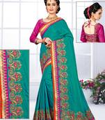 Teal hand woven silk saree with blouse