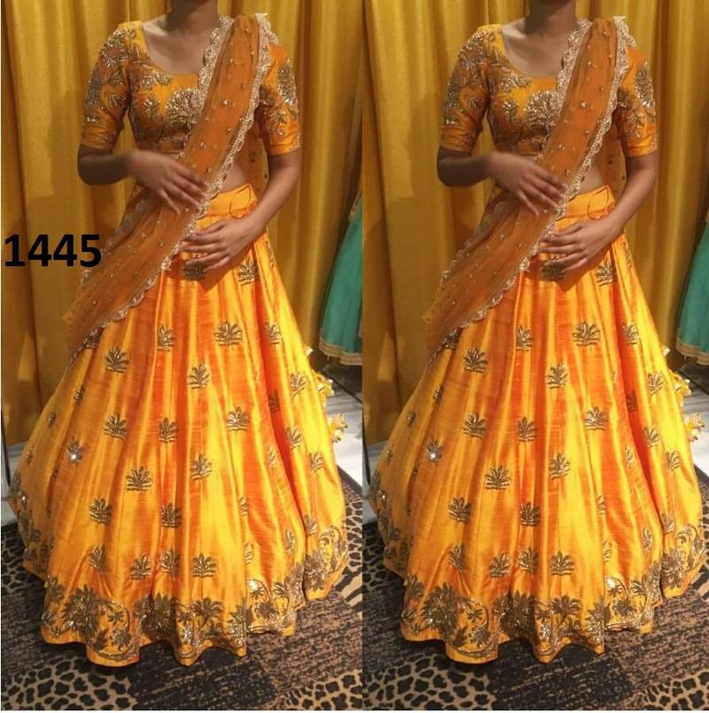 Bright Yellow Silk Lehenga With Multicolor Floral Threadwork And Net Dupatta main image 0