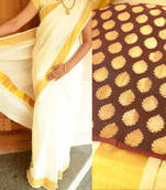 Off-white kerala kasavu saree with dark brown brocade blouse piece