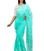 Sea green embroidered georgette saree with blouse