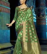 Green woven kanchipuram silk saree with blouse