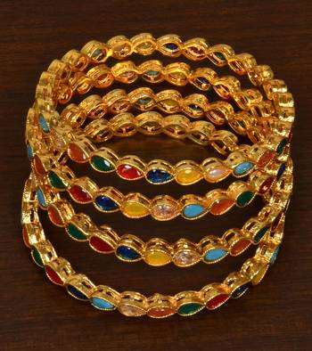 Gold plated kundan embellished bangles-and-bracelets 1