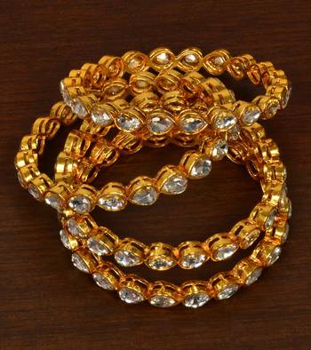 Gold plated kundan embellished bangles-and-bracelets 1
