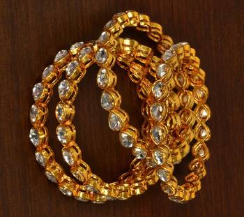 Gold plated kundan embellished bangles-and-bracelets 2