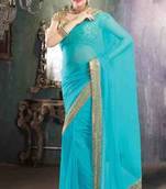 Sky blue georgette stoned worked saree in shimmering golden border