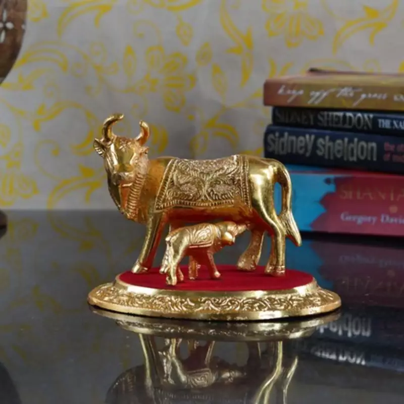 Golden Cow with Calf statue